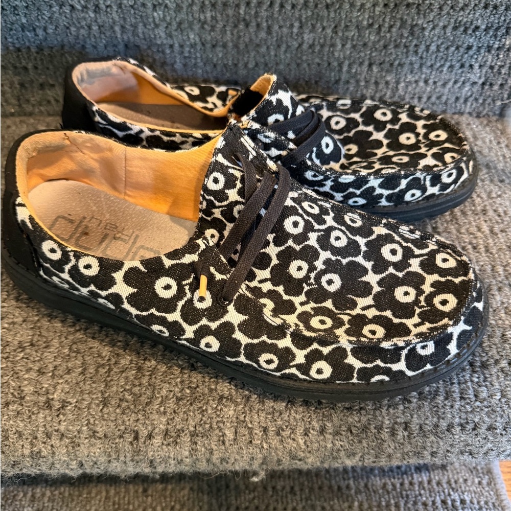 Hey Dude Black and White Floral Slip-On with Yellow Lining